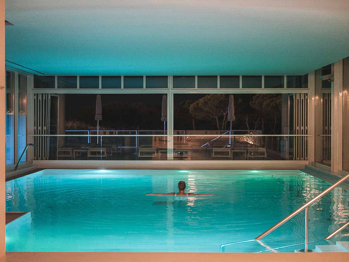 Girl playing in pool at Oitavos Hotel in Portugal