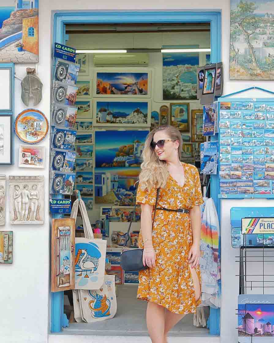 Girl standing in front of shop in Mykonos