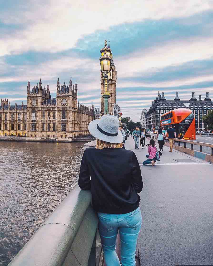 Girl in London looking at Big Ben