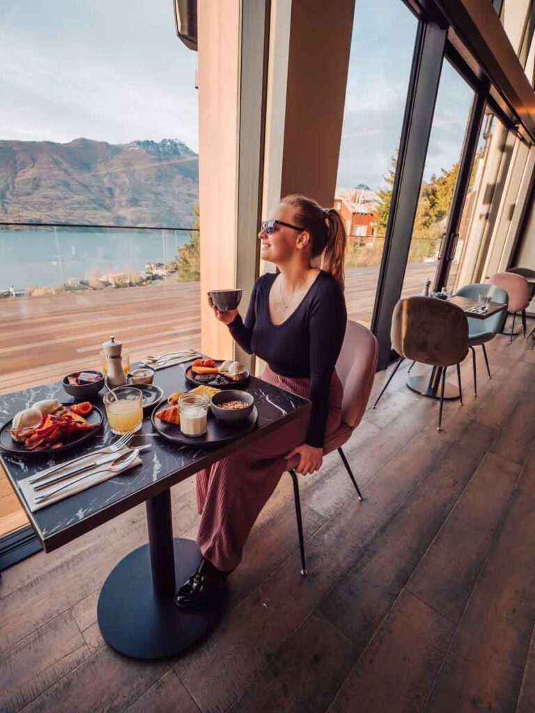 Girl having breakfast at Queenstown hotel