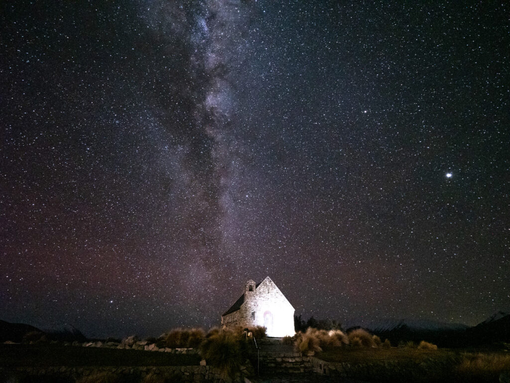 The Church of the Good Shepherd silhouetted beneath the Milky Way at Lake Tekapo