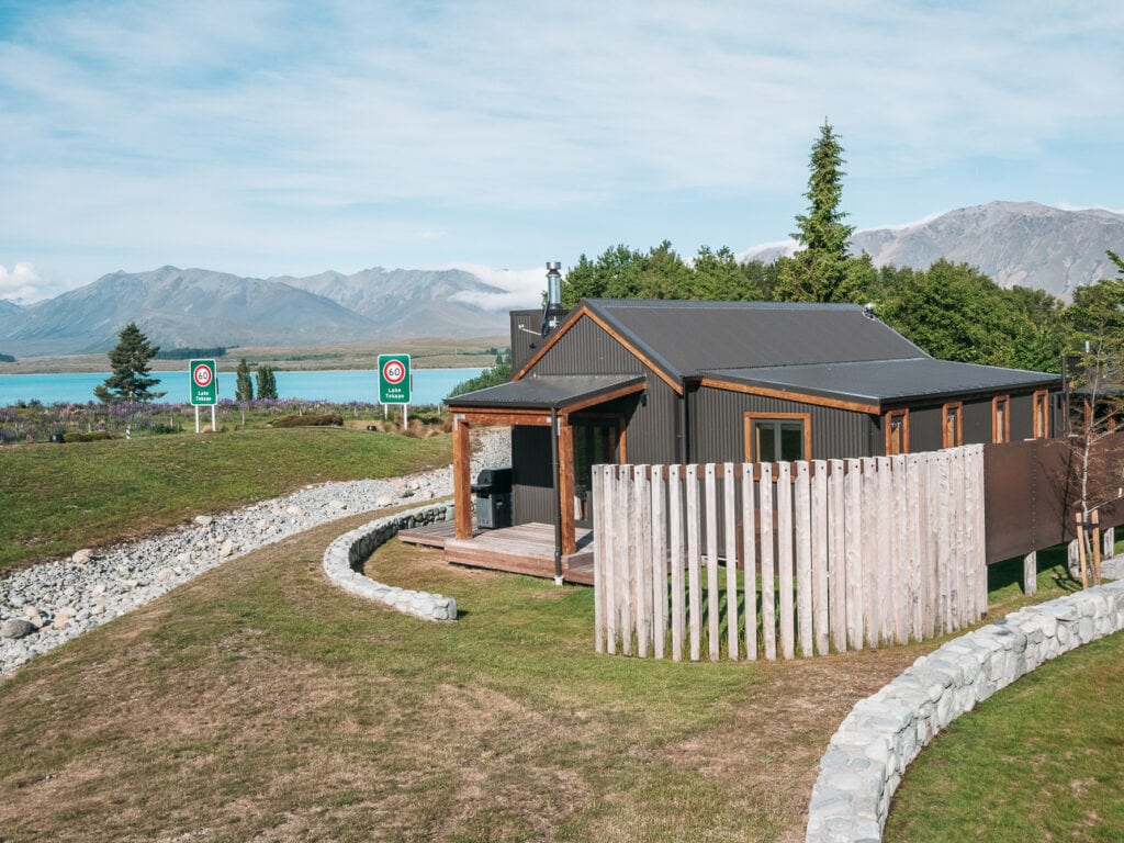 Alpine Lodges at The Cairns accommodation in Tekapo with Lake Tekapo visible behind