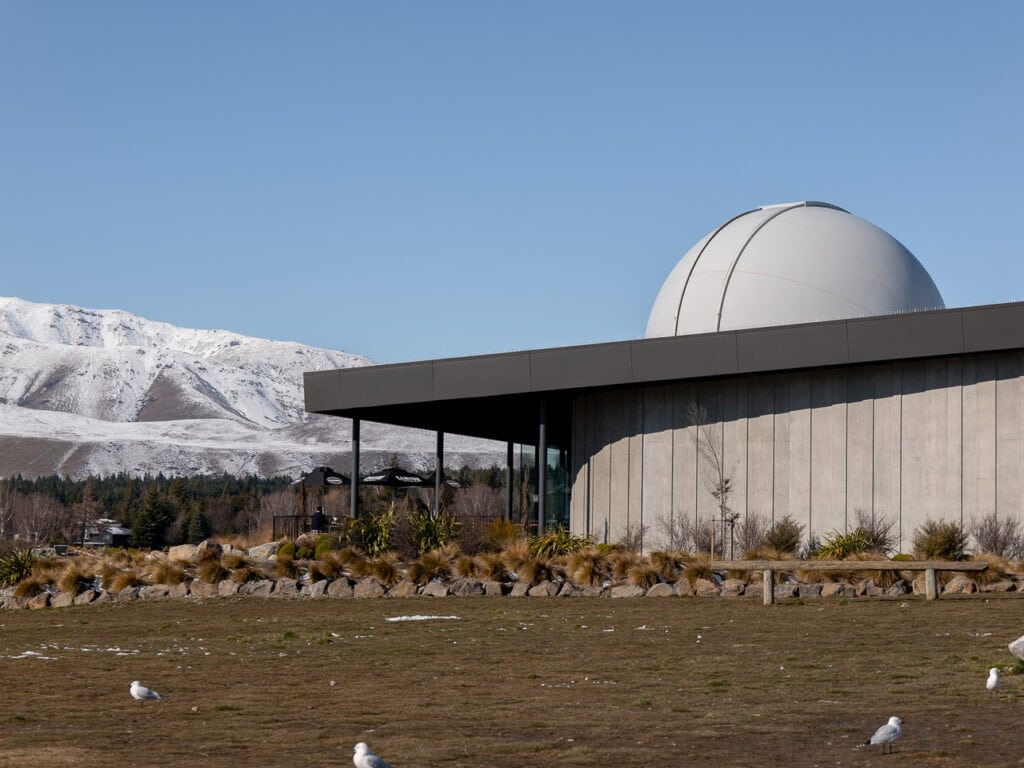 Exterior of the Dark Sky Project observatory building in Tekapo village, one of the best things to do in Tekapo for families or on a rainy day