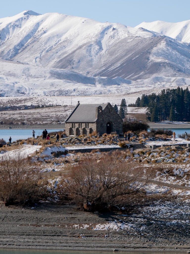The Church of the Good Shepherd beside a snow-covered Lake Tekapo in winter