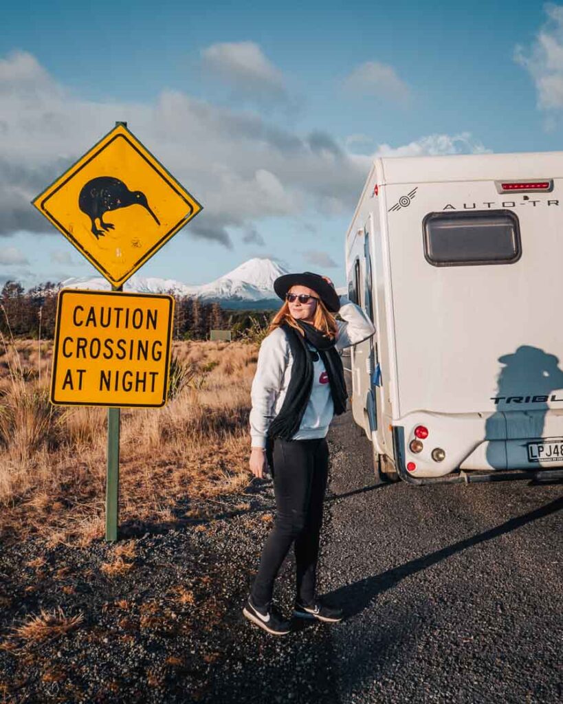 girl doing a north island road trip in a campervan