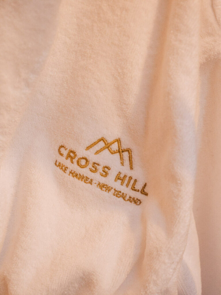 robe with cross hill domes embroidered on it