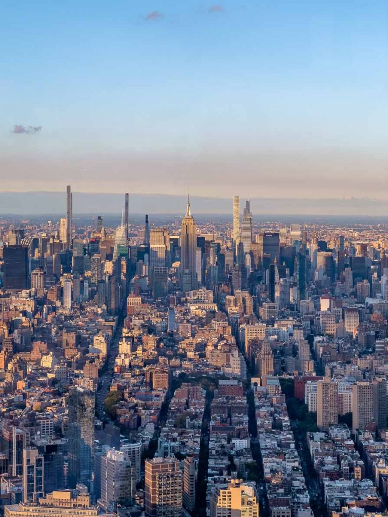 view of the new york skyline and empire state building from the One World Observatory