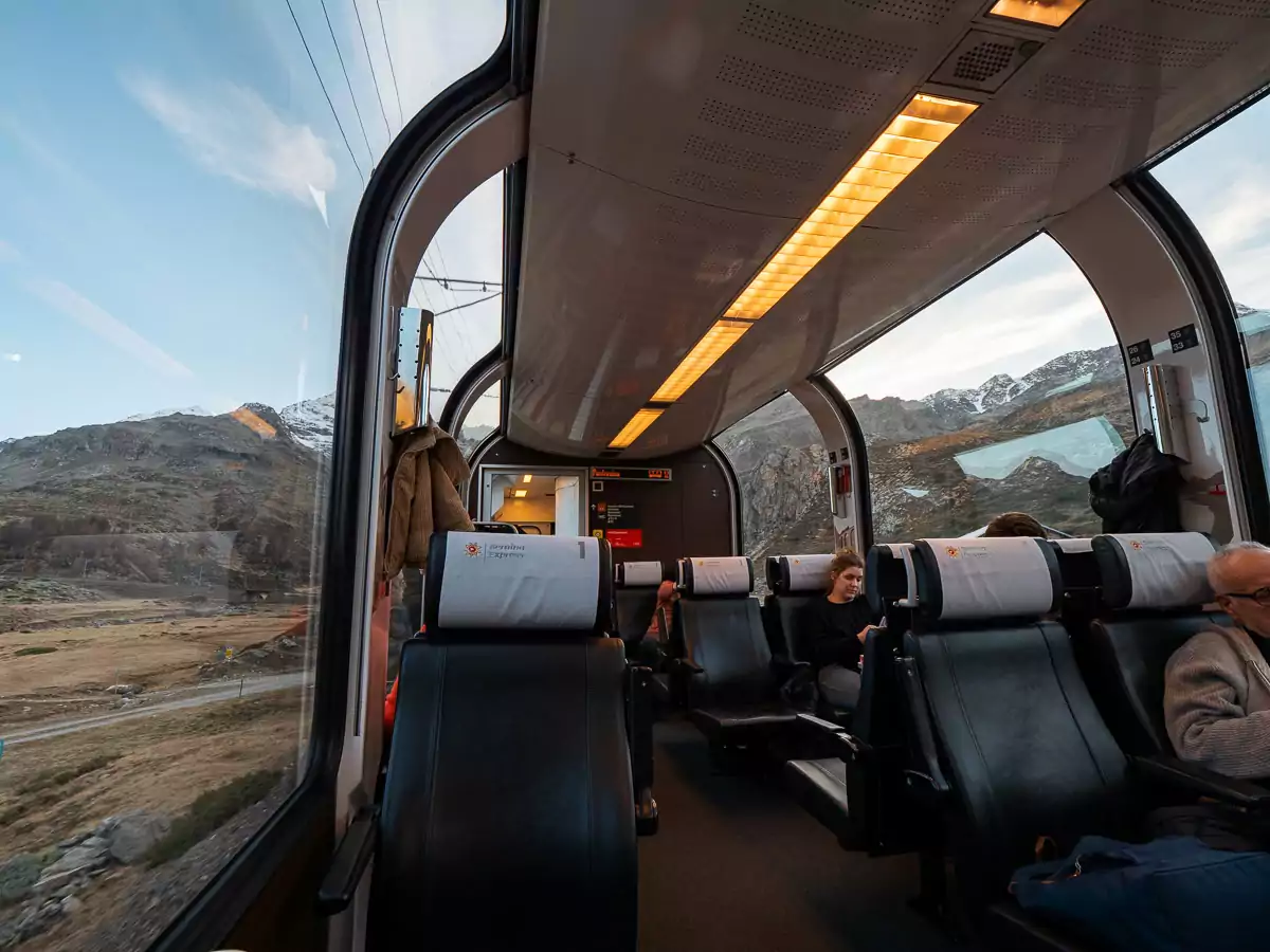 An interior shot of the Bernina Express 1st class carriage with panoramic windows