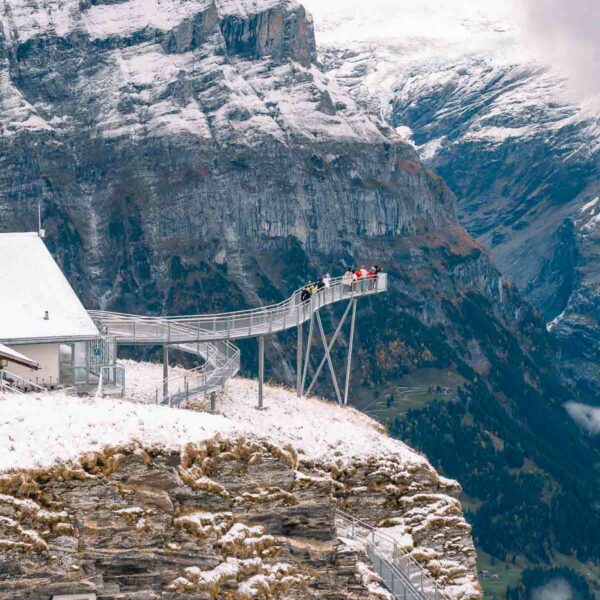 The Tissot Cliff Walk at Grindelwald First, a platform suspended above the cliffs with an expansive view of the alpine landscape