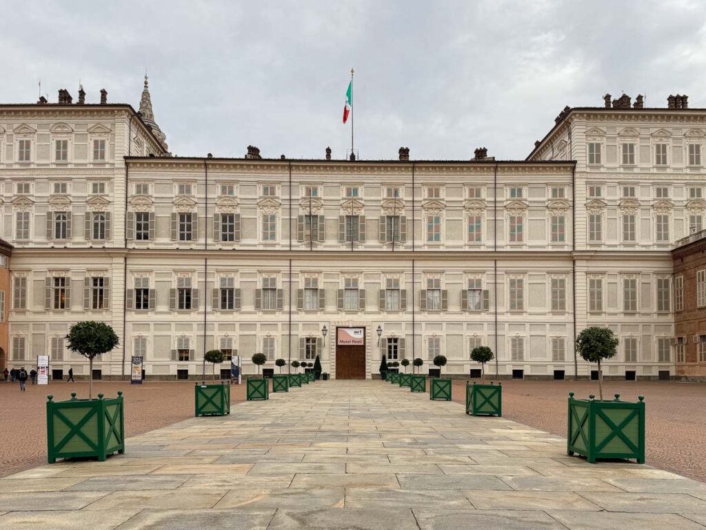 The grand facade of a museum in Turin, showcasing the elegant architecture to be explored on a Switzerland and Northern Italy itinerary