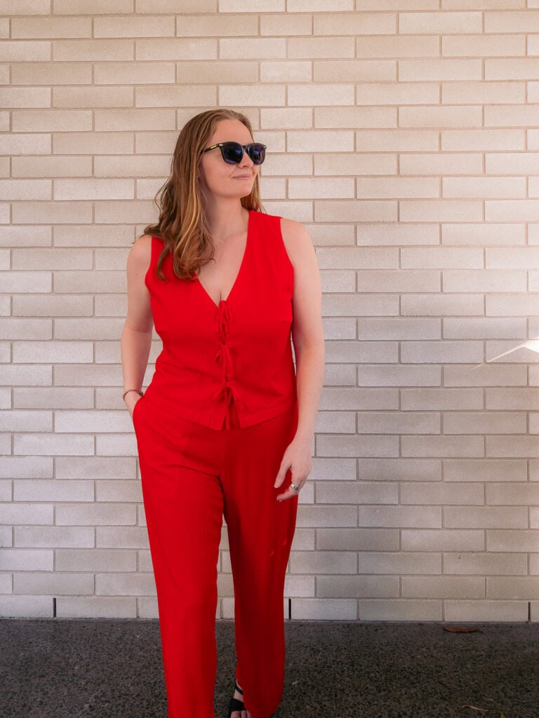 Red linen vest and trouser set from Heritage tailor in Hoi An, full length front view