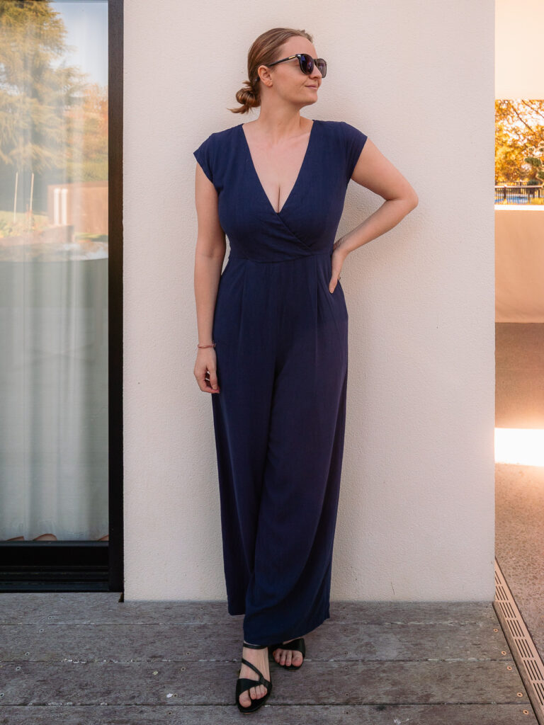 Navy V-neck jumpsuit from I Choose tailor in Hoi An, full length front view