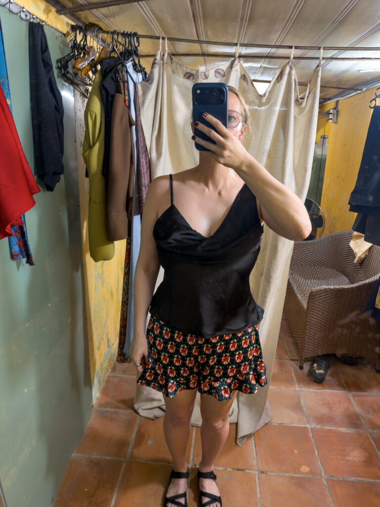 Black satin cowl neck camisole made by Blue Lantern Tailor in Hoi An, the proportions are off and it looks badly made