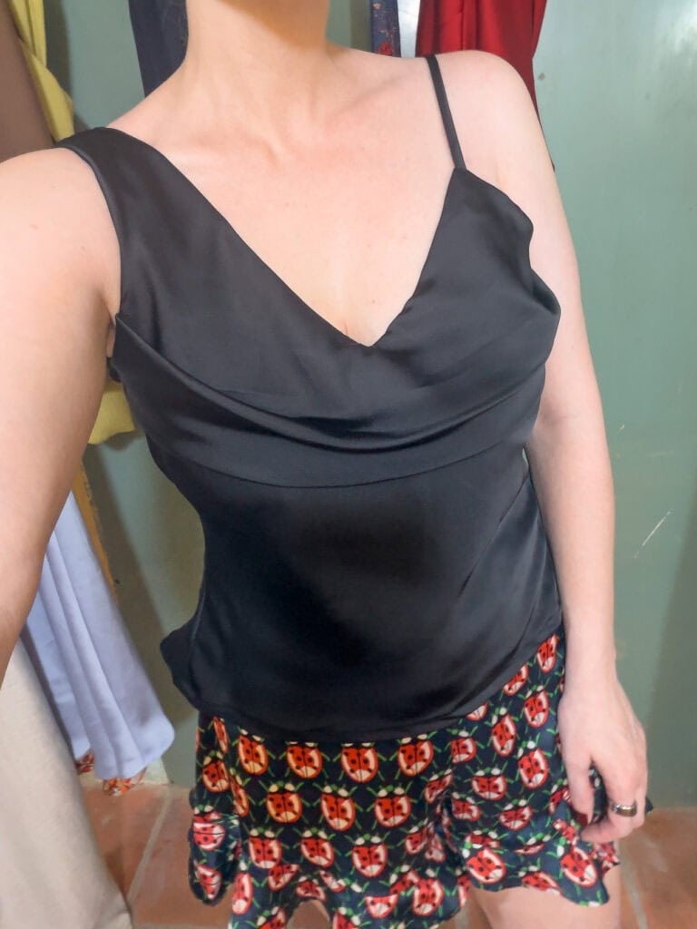 Black satin cowl neck camisole made by Blue Lantern Tailor in Hoi An, the proportions are off and it looks badly made