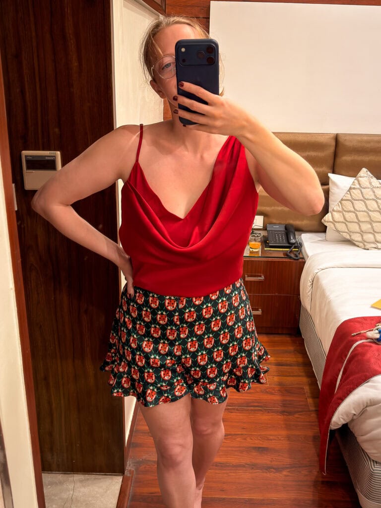 Red cowl neck top from Pink Lotus tailor with ladybird print shorts from Yaly Couture, Hoi An