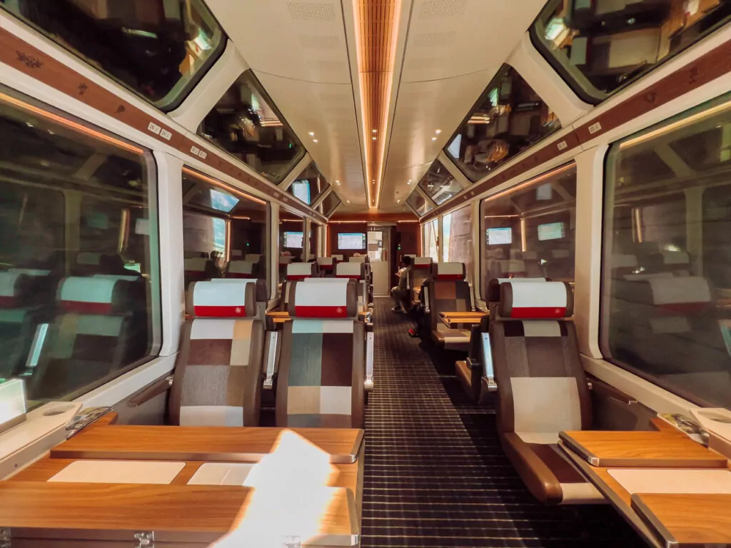 Glacier Express first class carriage showing the signature panoramic ceiling windows