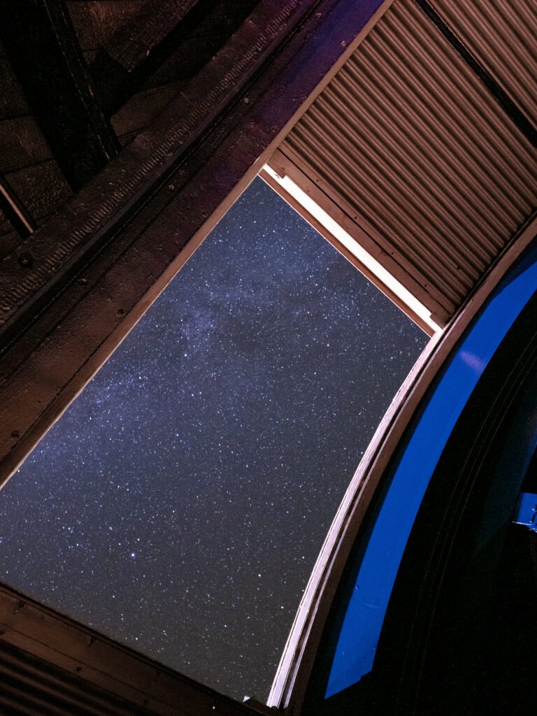 Night sky view through the observatory window at Randolins hotel in St Moritz