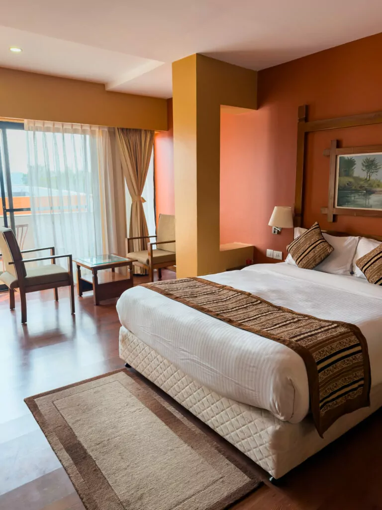 Double bed in a spacious room at the Landmark Forest Hotel in Pokhara