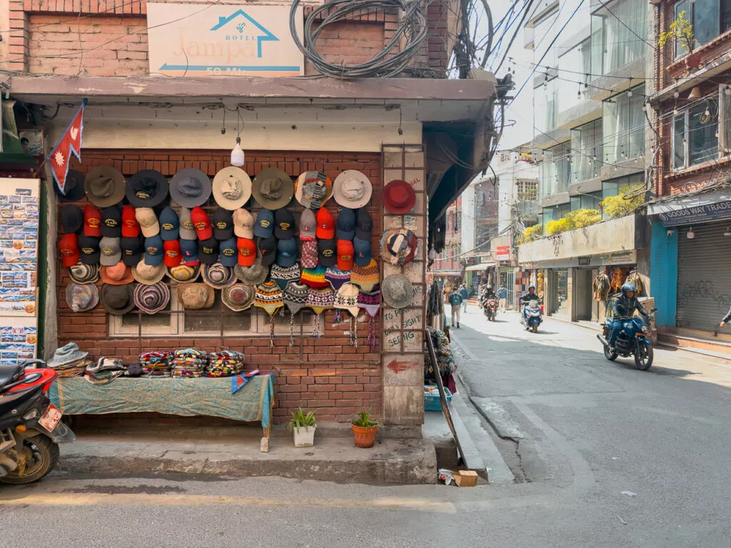 Colourful hats and bags displayed outside a shop in Thamel, Kathmandu
