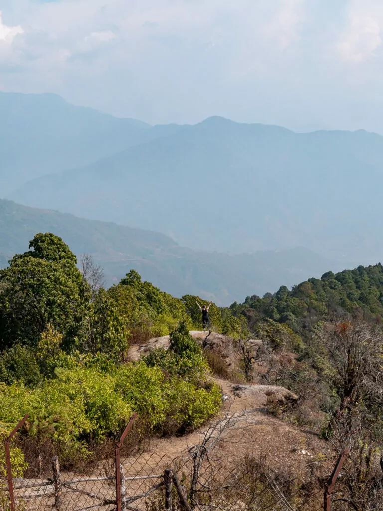 Lush green hills and hazy mountain views from the Australian Camp trek near Pokhara