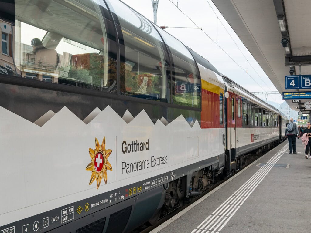 The Gotthard Panorama Express 1st class carriage with panoramic windows as viewed from the train platform