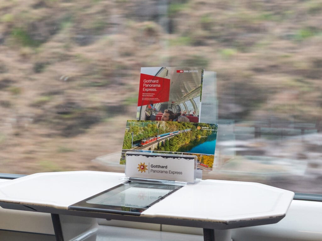 A Gotthard Panorama Express brochure on a 1st class in-seat table