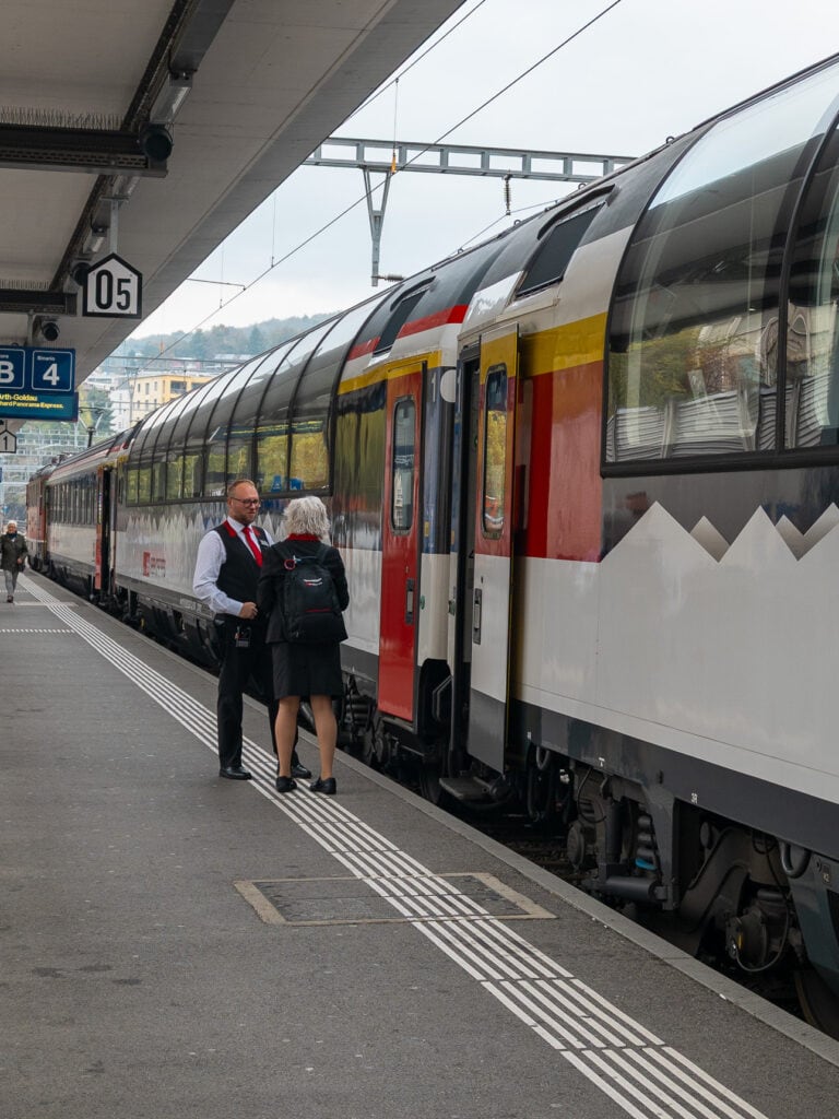 The Gotthard Panorama Express train waiting on the platform at Lugano station before departure