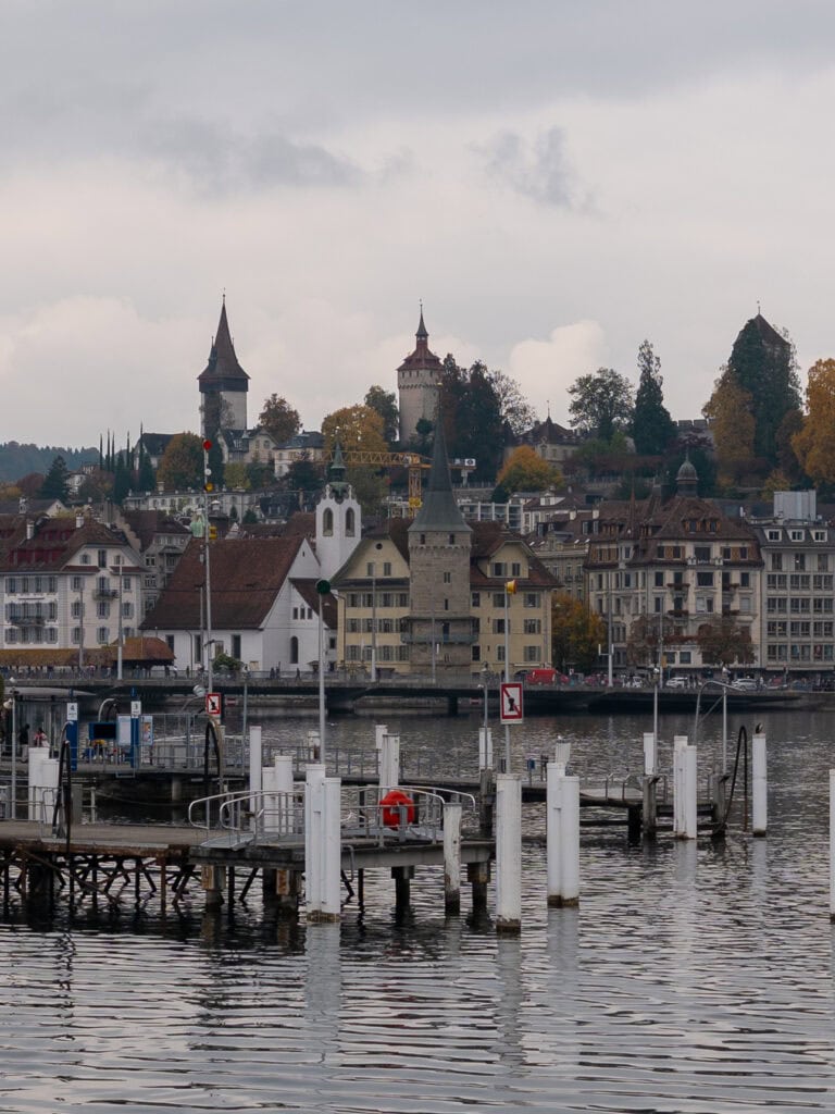 Lucerne's historic lakeside buildings and old town skyline seen from Pier 6 on Lake Lucerne