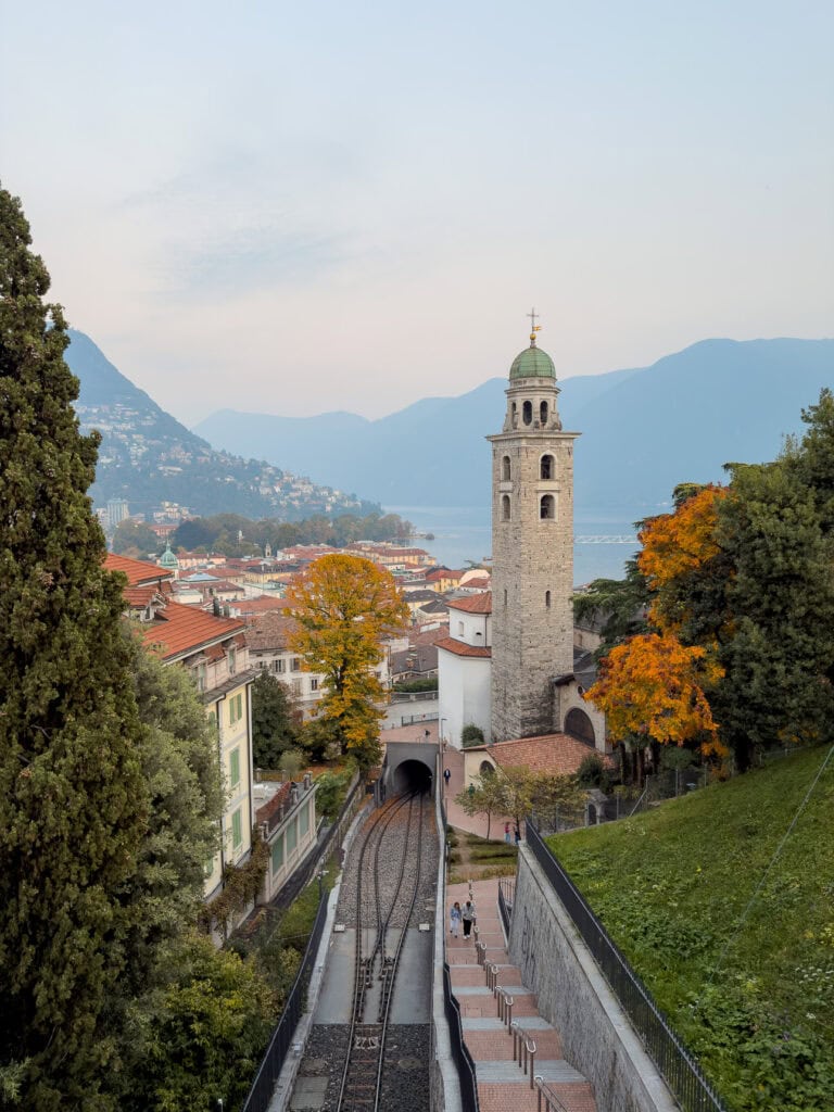 Lugano's historic Cathedral of Saint Lawrence seen from the funicular that connects the train station to the city centre