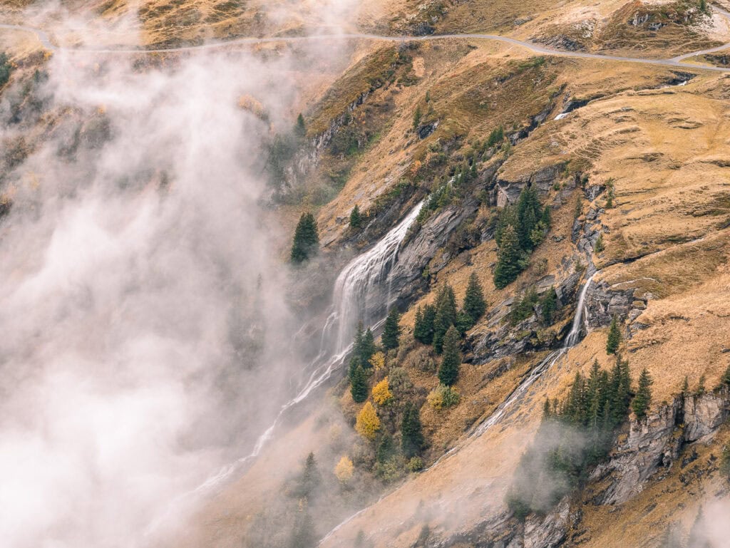 Waterfalls and low cloud on the mountainside near Grindelwald First