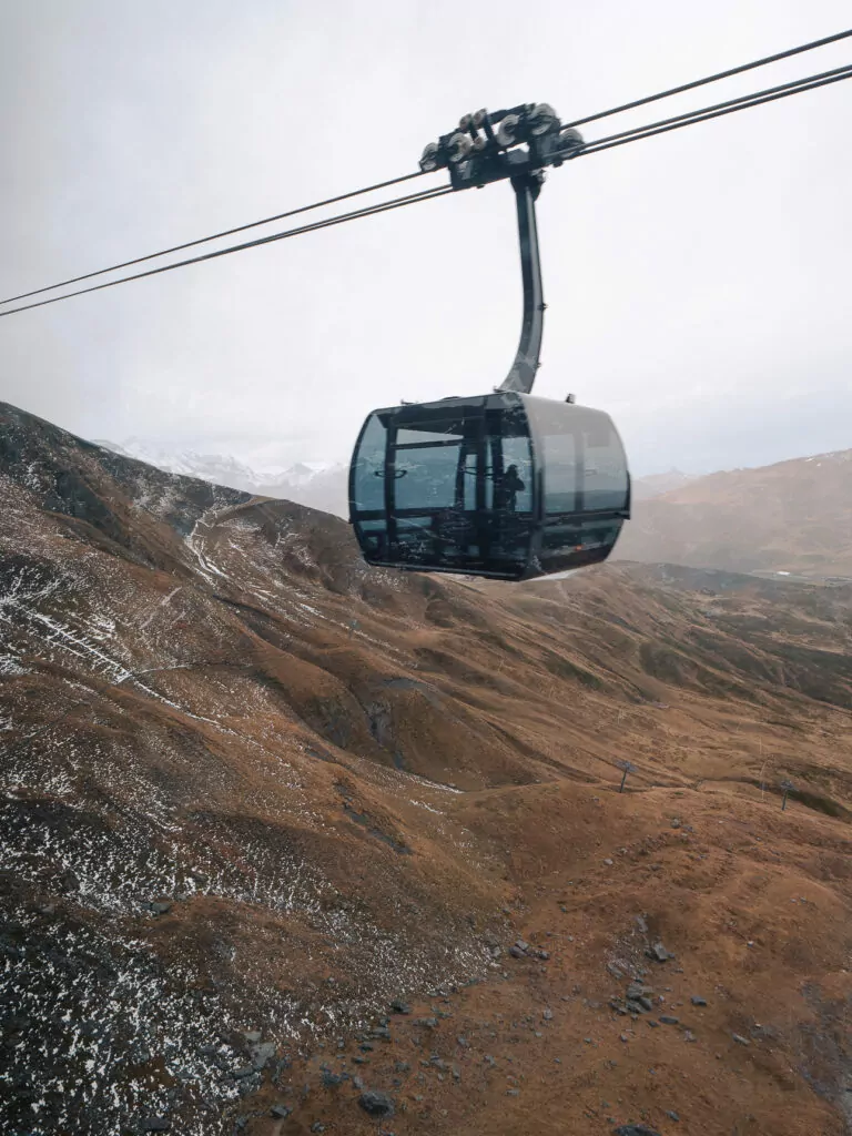 Cable car travelling above the mountains near Eigergletscher