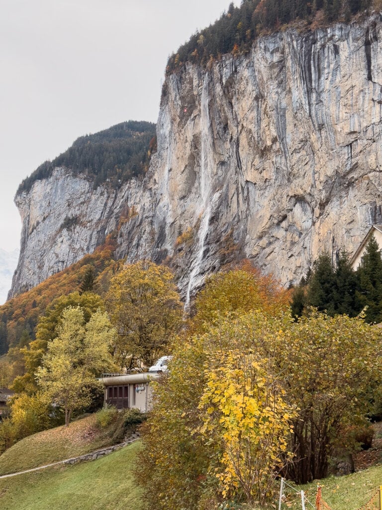Staubbach Falls dropping from the cliffs above Lauterbrunnen in autumn