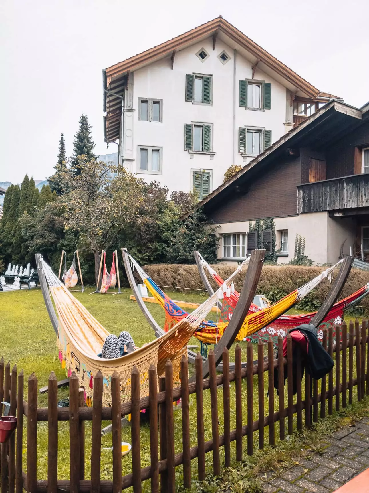 Colourful hammocks in a garden at a hostel in Interlaken, Switzerland