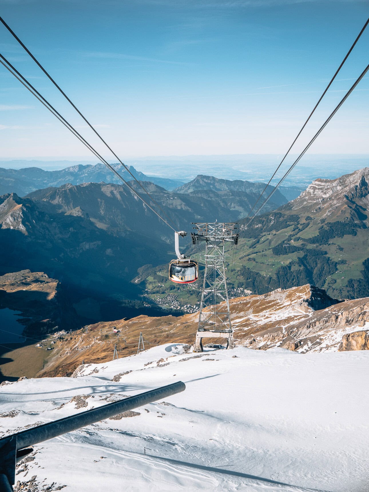 Titlis Rotair cable car above snowy mountains near Engelberg